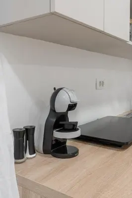 a microscope sitting on a table in a room at Classy & Cozy apartment 2 in Ljubljana