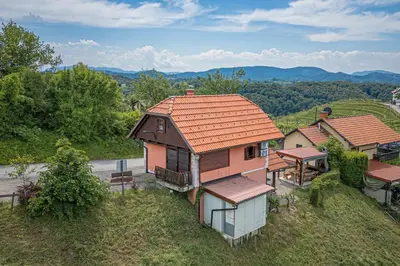 an overhead view of a house with a table at Vineyard Cottage Vesna Lake View - Happy Rentals in Veliki Vrh