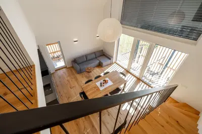 an overhead view of a living room with a table and a couch at WINERY AND APARTMENTS MAROF in Bistrica ob Sotli