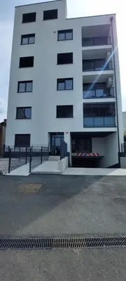 a white building with a lot of windows at LA Studio in Maribor