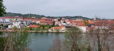 a view of a city with a body of water at LA Studio in Maribor