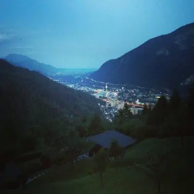 a view of a town in a valley with mountains at A Cottage in the Alps for hiking, cycling, skiing in Jesenice