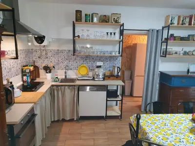 a kitchen with a sink and a counter top at Apartment with Terrace Nona Pavla in Tolmin