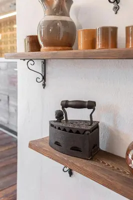 a toolbox sitting on a shelf on a wall at DoLodge Homestead & Camper Parking Kolpa River Canyon in Stari Trg ob Kolpi