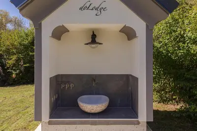 a stoneificialificialificialificialificialificialificialificialificialificialificialificialificialificial at DoLodge Homestead & Camper Parking Kolpa River Canyon in Stari Trg ob Kolpi